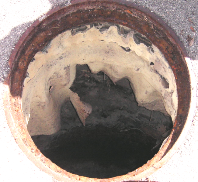 Failing Spray-on Topical Coating in Miami Dade Manhole